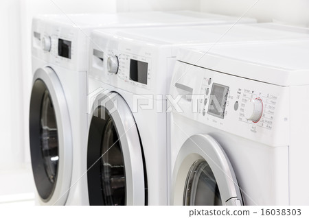line of laundry machines line of laundry machines 16038303