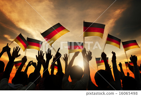 Silhouettes of People Holding Flag of Germany Silhouettes of People Holding Flag of Germany 16065498