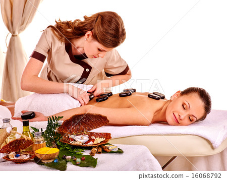 Woman getting spa lastone therapy outdoor. Woman getting spa lastone therapy outdoor. 16068792