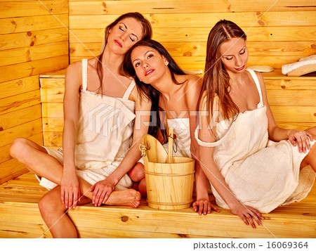 Woman relaxing in sauna. 16069364