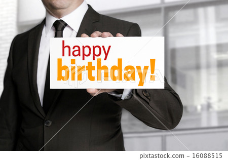 happy birthday sign is held by businessman 16088515