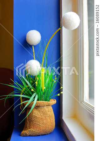 Flower pot on window sill 16089152