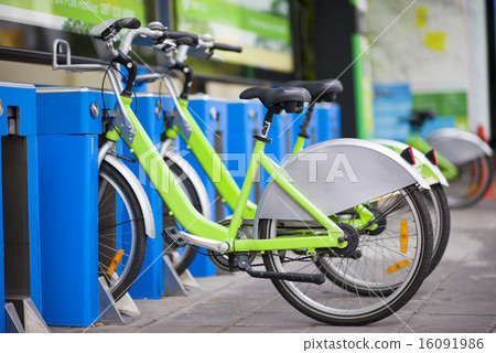 Bicycle for rent parking in a row Bicycle for rent parking in a row 16091986