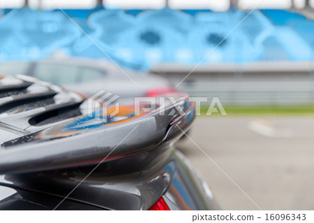 close up of car spoiler on speedway at stadium 16096343