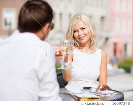 couple drinking wine in cafe couple drinking wine in cafe 16097246