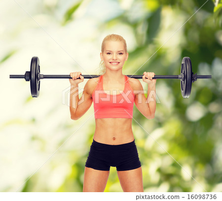 smiling sporty woman exercising with barbell smiling sporty woman exercising with barbell 16098736