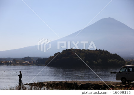 Silhouetted fishing man Silhouetted fishing man 16099355