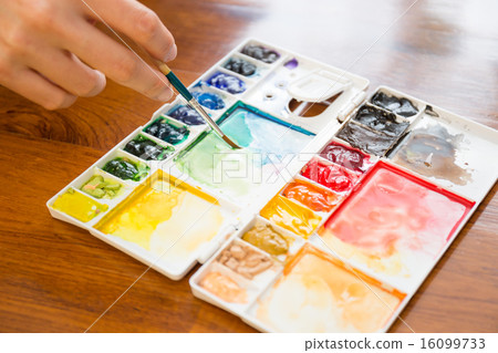 Paintbrush and paint palette 16099733