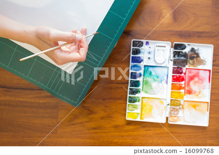 Paintbrush and paint palette 16099768
