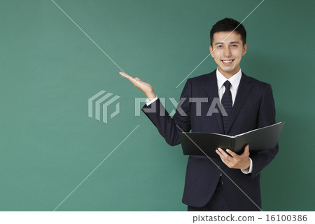 Pointing male instructor Pointing male instructor 16100386