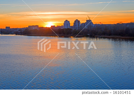 Sunset over the city. Sunset over the city. 16101451
