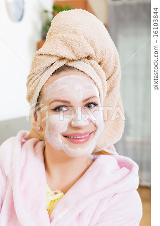 Girl with cream over face 16103844