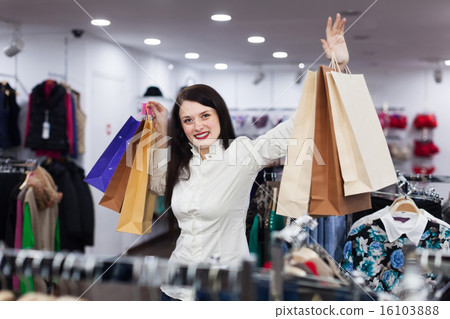 Young female buyer shopping bags Young female buyer shopping bags 16103888