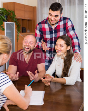 Two couples discussing and smiling 16104153