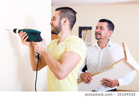 Two skilled men doing maintenance 16104592
