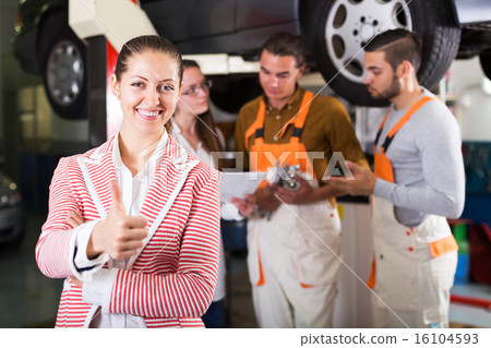 Mechanics and happy customer Mechanics and happy customer 16104593