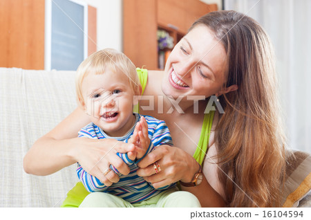 Portrait of happy mom with toddler Portrait of happy mom with toddler 16104594