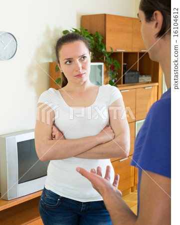 Young couple having serious discussion Young couple having serious discussion 16104612