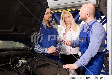 Worried girl talking with specialists 16105200
