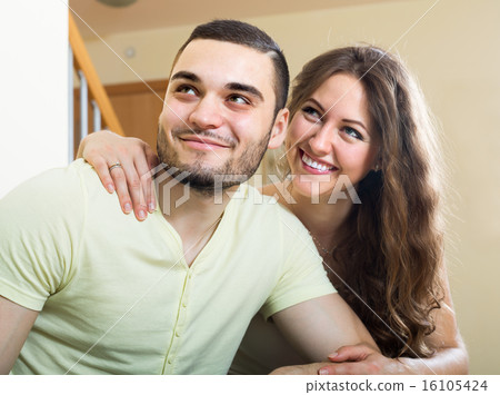 Adult couple on sofa in home 16105424