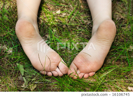 Feet of little girl outdoors 16106745