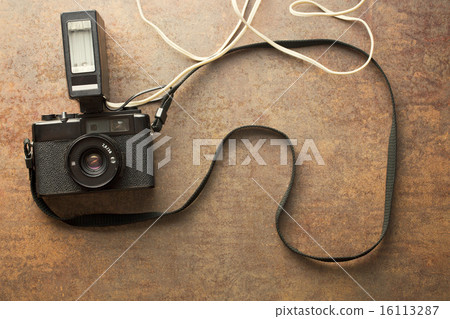 old analogue camera with flash 16113287