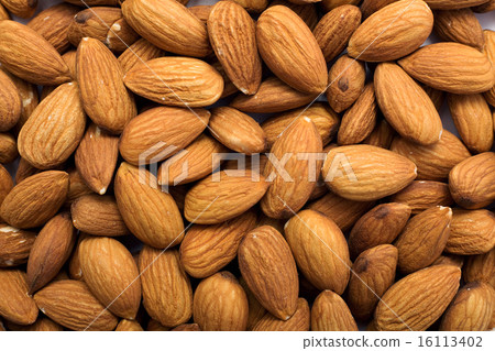 Cleared golden almonds background 16113402