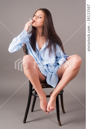 beautiful young brunette woman with cigarette beautiful young brunette woman with cigarette 16113567