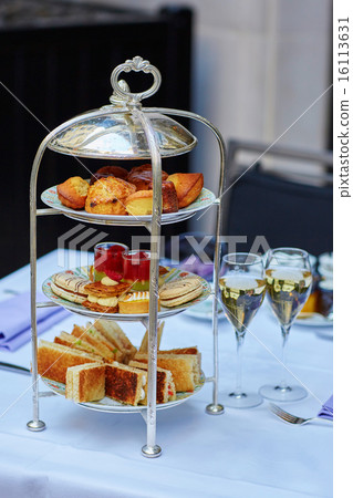 Beautiful table setting for high tea ceremony 16113631