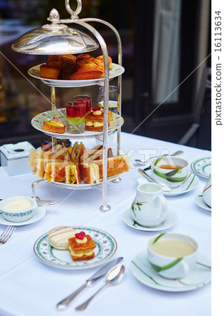 Beautiful table setting for high tea ceremony 16113634
