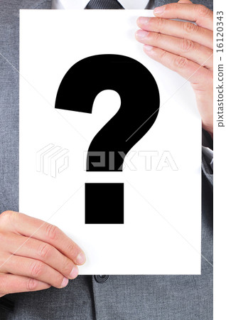man in suit holding a signboard with a question mark on it man in suit holding a signboard with a question mark on it 16120343
