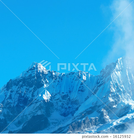 High mountains, covered by snow. 16125932