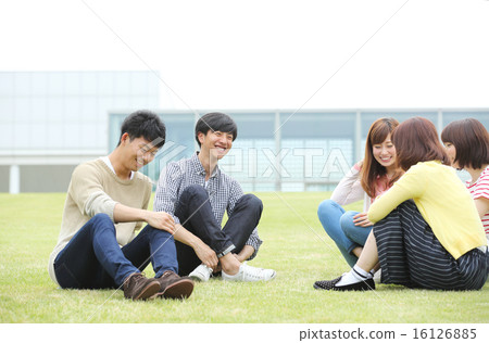 College students talking in the school yard College students talking in the school yard 16126885