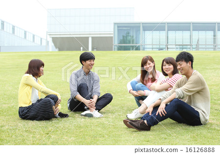 College students talking in the school yard College students talking in the school yard 16126888