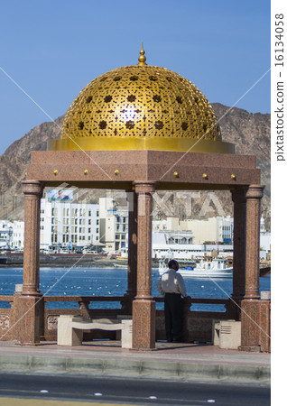 Local enjoys view of harbour in Muscat, Oman 16134058