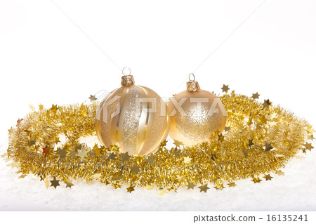 Gold tinsel and baubles 16135241