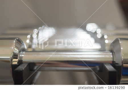 Dumbbell gym metal weights in gym health club 16139290