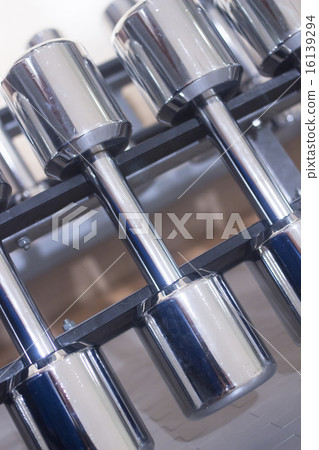 Dumbbell gym metal weights in gym health club 16139294