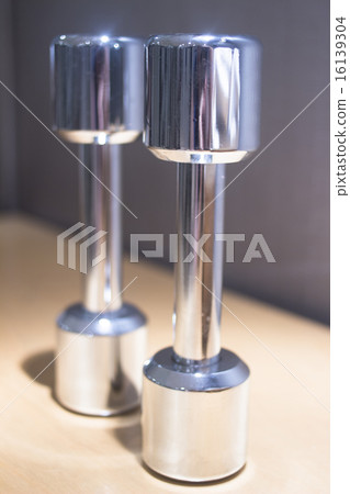 Dumbbell gym metal weights in gym health club 16139304