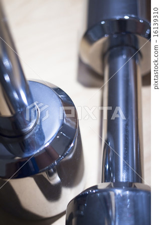 Dumbbell gym metal weights in gym health club 16139310