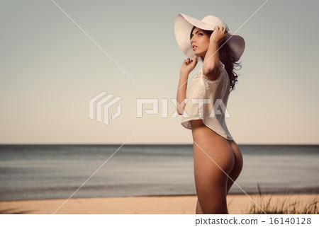 Naked woman on the beach Naked woman on the beach 16140128