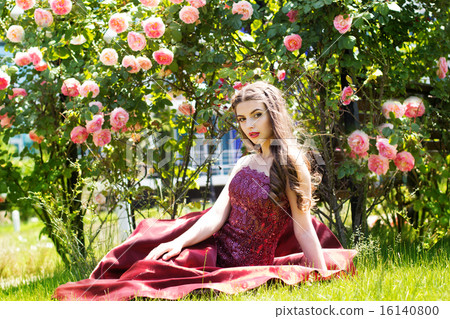 Portrait of fashion girl near pink roses Portrait of fashion girl near pink roses 16140800