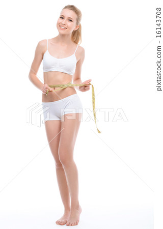 Beautiful fit girl with measuring tape 16143708
