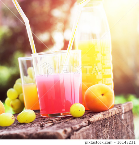Fruits and Glasses with Mix Juice 16145231
