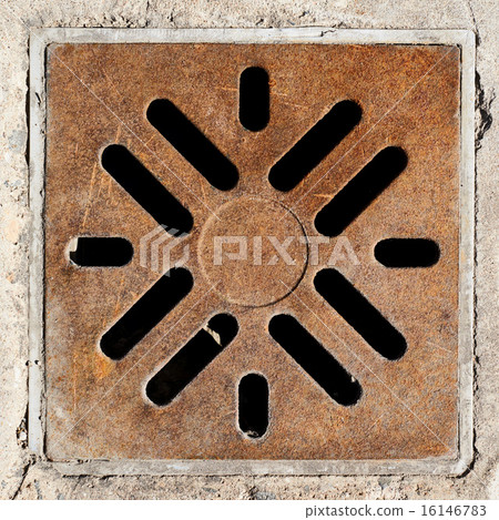 Rusty drain grate in concrete floor Rusty drain grate in concrete floor 16146783