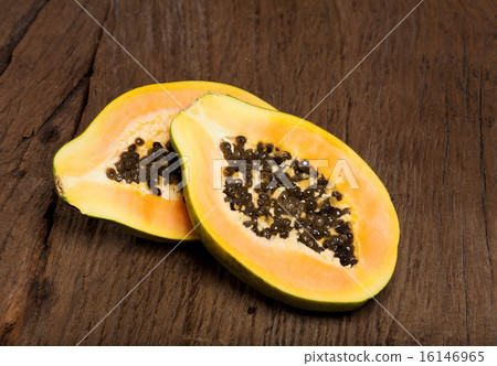 Halved papaya fruit Halved papaya fruit 16146965