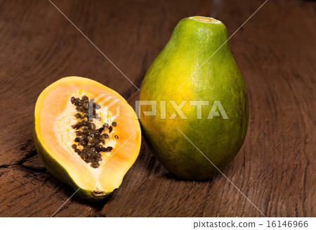 Halved papaya fruit Halved papaya fruit 16146966
