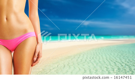 Woman on beautiful beach at Maldives 16147451