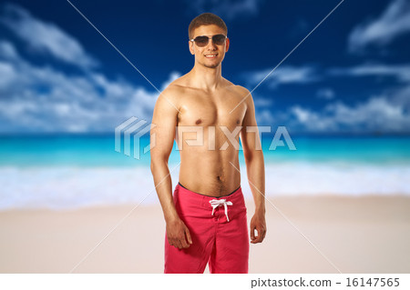 Man on Anse Intendance beach at Seychelles 16147565