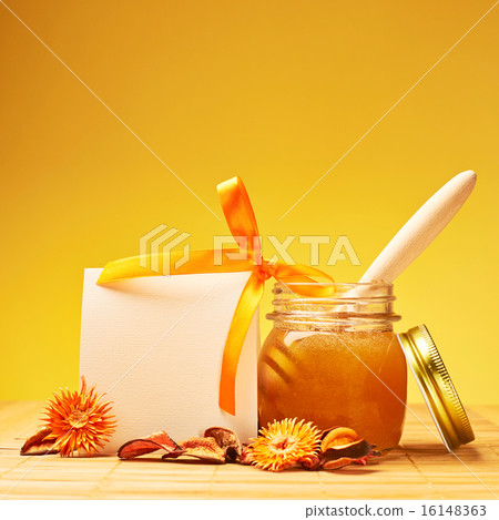 Honey jar and empty white card composition 16148363